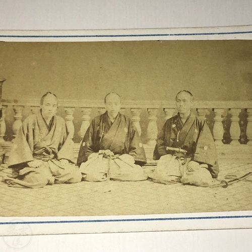 CDV of Three Samurai Sitting on Carpet Next to stove for heating