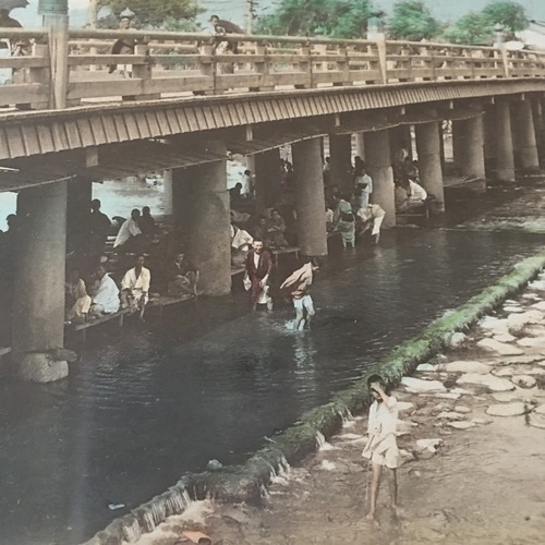 Large Format Photo of Sanjo Ohashi Bridge in Kyoto with people cooling down under the bridge