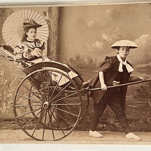 Cabinet Card of Woman and Female Rickshaw Driver taken by Ichida Sōta of Kobe