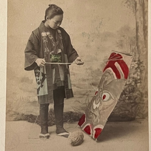 Medium format photo of Boy and Kite Hand-coloured albumen print