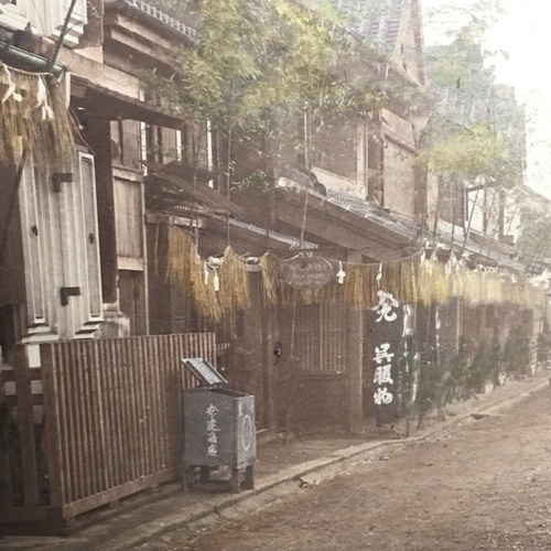 Large format photo of Bentendori, Yokohama showing the Nozawaya Silk Store taken by Kusakabe Kimbei