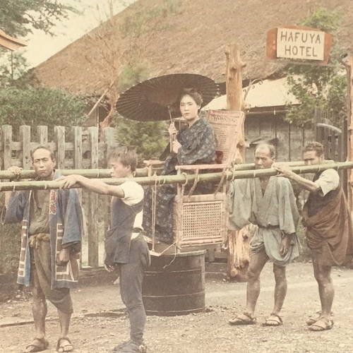 Large format photo of a Kago (Palanquin) Travelling Chair in front of Hafuya Hotel, Hakone Hand-coloured albumen photo