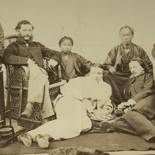 Early photo of Westerners Drinking with Japanese Attendants Uncoloured albumen photo